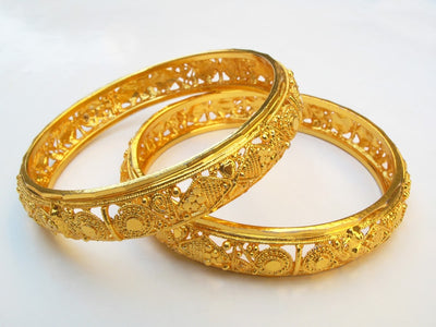 Gold Bangles: Discover the Timeless Elegance of Bangle Bracelets and Fine Jewelry