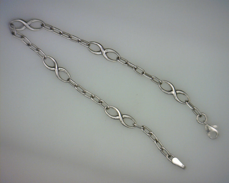 White Polished 10 Karat Infinity Link Bracelet Len - Van Drake Jewelers